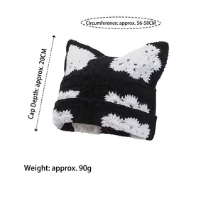 Handmade crochet cat ear beanie in black and white knit with 20cm depth and 56-58cm brim