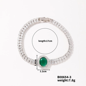 Detail view of silver luxury bracelet with green oval stone and 17cm length specification