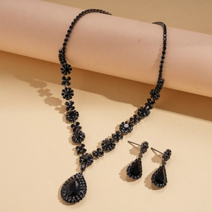 Dark style vintage necklace and drop flower earrings set with black crystals and teardrop gems