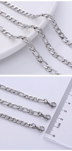 Close-up of 5mm silver stainless steel Figaro chain with secure lobster clasp closure