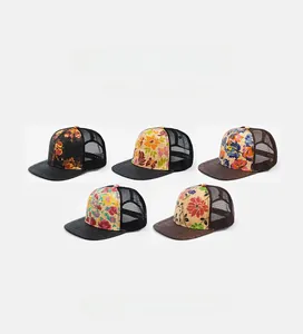 Detail showing various floral print mesh trucker hats with breathable back and adjustable strap