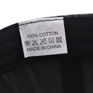 Detail of 100% cotton wash label and inner stitching on vintage style outdoor baseball cap