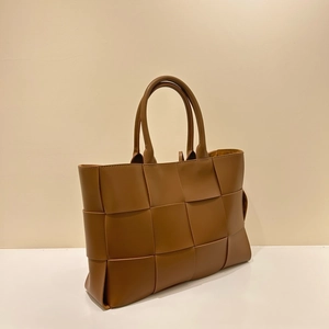 Handwoven brown leather tote bag with large square weave pattern for summer 2025