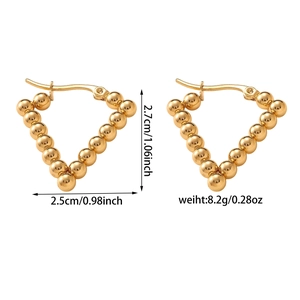 Detail view of V-shaped gold beaded earrings with height and weight measurement specs