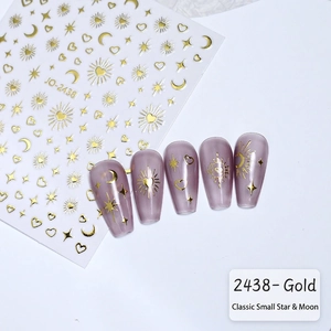 Detail of JO-2438 gold star and moon nail stickers with metallic reflective finish