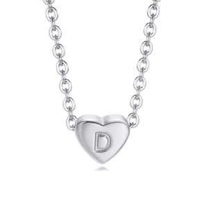 Detailed macro view of silver heart pendant featuring an engraved letter D on chain