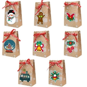 Set of 8 European Kraft paper Christmas gift bags with red ribbons and festive patterns