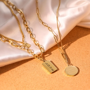 Three-piece layered gold titanium steel necklaces with LOVE and round engraved pendants
