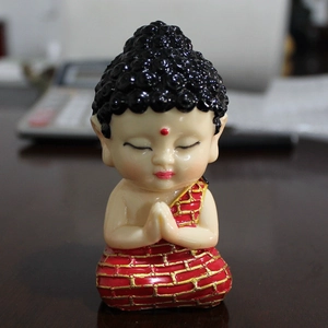 Zen style cute little monk statue for car dashboard decor with praying gesture