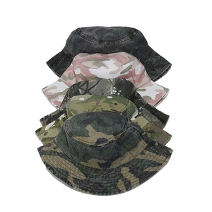 Set of four vintage washed camouflage bucket hats in various colors for outdoor hiking
