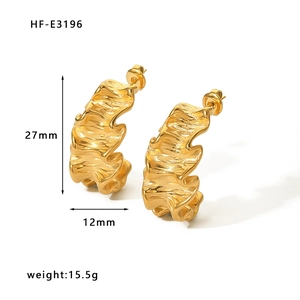 Irregular textured 18K gold-plated wave earrings, size 27x12mm, studio shot on white