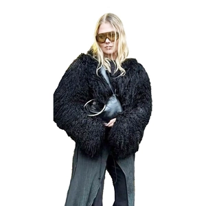 Women's oversized faux fur coat in black with long sleeves and wide collar for winter