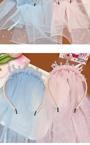 Close-up of glitter tulle princess crown headbands with pearls and colorful sequins