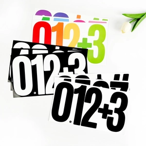 Detailed view of 6-inch waterproof number stickers in black, white and colorful designs
