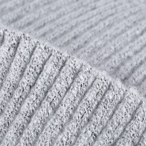Close-up of light grey ribbed knit texture with warm fleece lining for men beanie