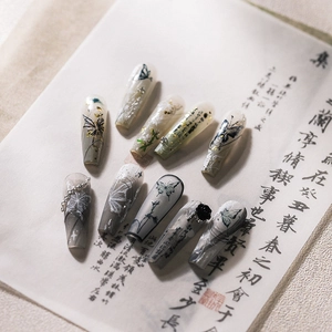 3D embossed press-on nails with butterfly and orchid patterns in long trapezoid shape