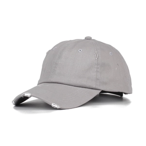 Close-up of distressed grey washed cotton baseball cap featuring vintage frayed edge details