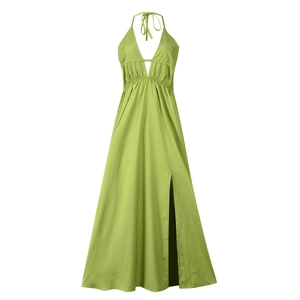 Detail of lime green backless halter maxi dress with deep V-neck and high side slit