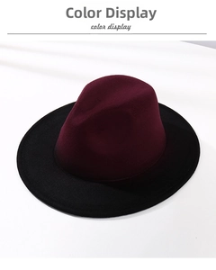 Top-down view of a two-tone fedora hat featuring a burgundy crown and black wide brim