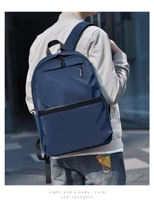Blue business laptop backpack with breathable mesh back and ergonomic shoulder straps