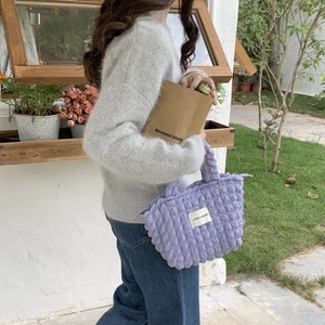 Close-up of lavender popcorn texture tote bag featuring a stitched LOVE SOZAKKA label