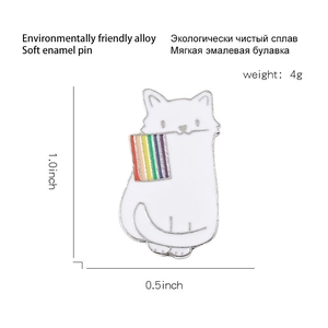 Cartoon white cat enamel pin holding a rainbow flag with product size and weight specs