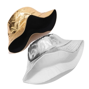 Close-up of metallic gold and silver bucket hats showing shiny texture and fold details