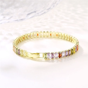 Colorful zircon tennis bracelet in gold plating with vibrant multi-colored gemstones