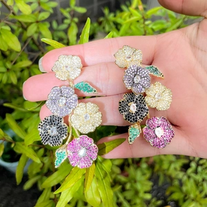 Exaggerated S925 floral earrings featuring vibrant multicolored zircon and gold finish