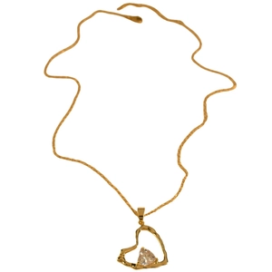 Elegant gold stainless steel necklace with a hollow heart pendant and a clear sparkling gem