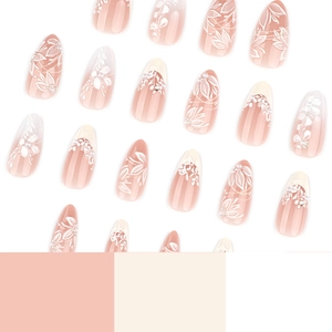 Handmade press-on nails with 3D white flowers, pearls and lace on nude long stiletto tips