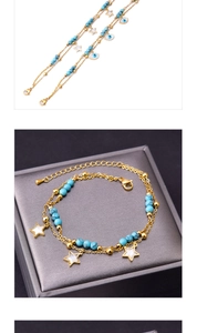 Detail of gold layered anklet featuring turquoise beads, shell star, and evil eye pendant