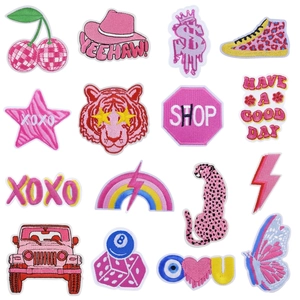 Detailed grid of 16 colorful embroidered patches with cartoon animals and text labels