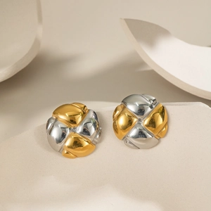 Polished two-tone gold and silver circular button stud earrings in stainless steel