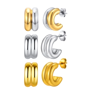 Double-layered C-shaped stainless steel hoop earrings in gold, silver, and two-tone finishes