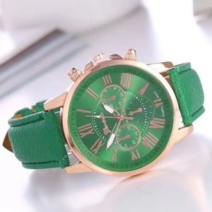 Detail view of Geneva quartz watch with green sunray dial and rose gold roman numerals