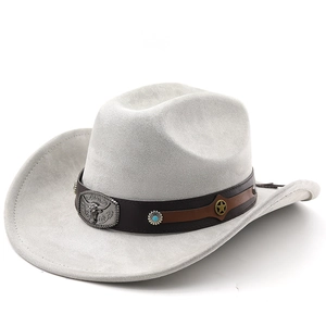Detail of western cowboy hat featuring silver bull buckle and turquoise studs decoration