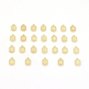 Cuban link bracelet with gold rectangular 26 letter charms and sparkling crystal zircons