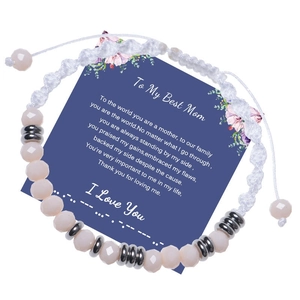 Detail of hand-woven beaded bracelet with pink crystals on 'To My Best Mom' gift card