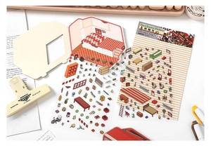 Close-up of 2.5D nostalgic miniature stickers and foldable scene board for journaling