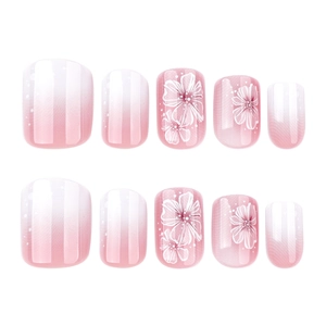 Pink gradient press-on nails with white flower patterns and glossy finish set of 10