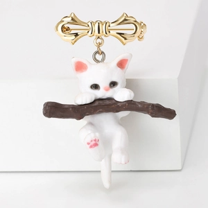 Cute white cat on brown branch brooch with golden alloy bow accent for women
