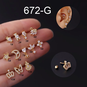 Collection of 12 gold titanium steel stud earrings with zircons and crown heart shapes