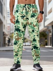 Detail of men's urban camo joggers featuring elastic cuffs and drawstring waist