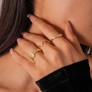 Three-piece set of gold irregular textured and smooth geometric open rings for women
