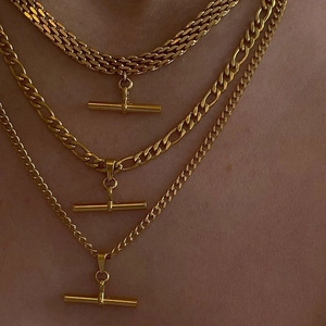 Layered 18K gold stainless steel Figaro and rope chain necklaces with minimalist T-bar pendant