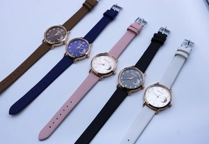 Set of five quartz watches in diverse colors featuring moon and star dial designs
