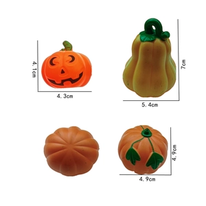 Set of 4 orange plastic Halloween pumpkins in various sizes with Jock-o'-lantern face