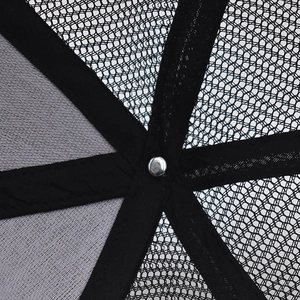 Close-up of internal mesh structure and reinforced seams on the black baseball cap