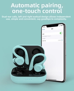 Detail of mint green TWS sports earbuds with LED power indicator on the charging case